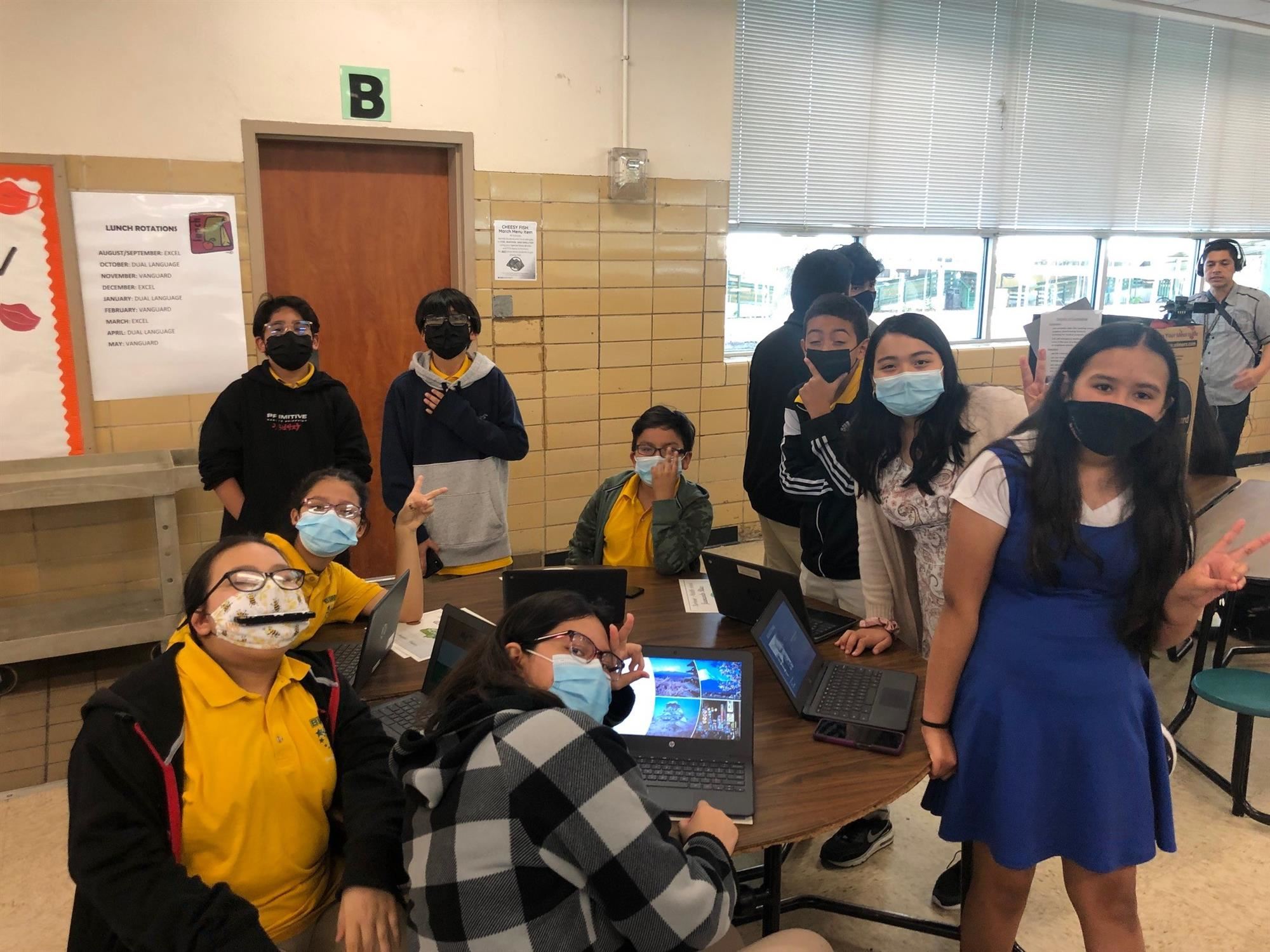 Students posing with their projects